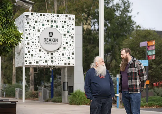 Al and Bryan Fricker in front of Deakin Burwood cube