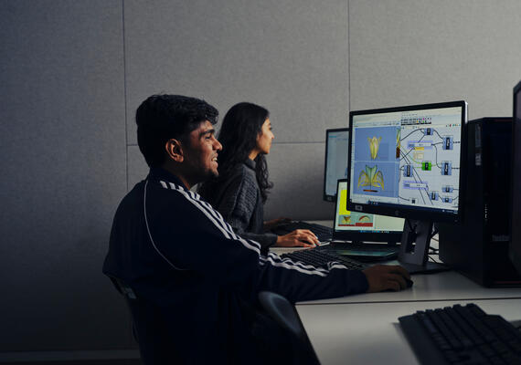 Students at computer studying