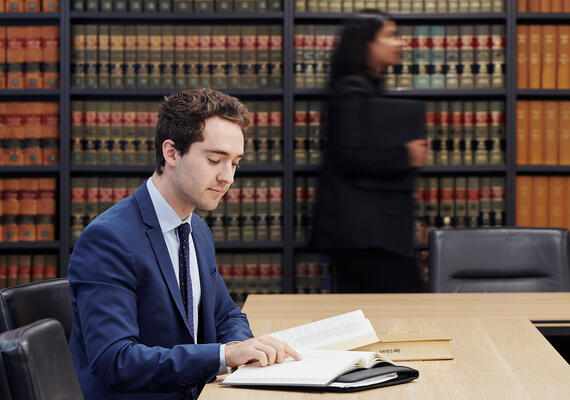 Student researches in Victorian Bar Association library/meeting room.
