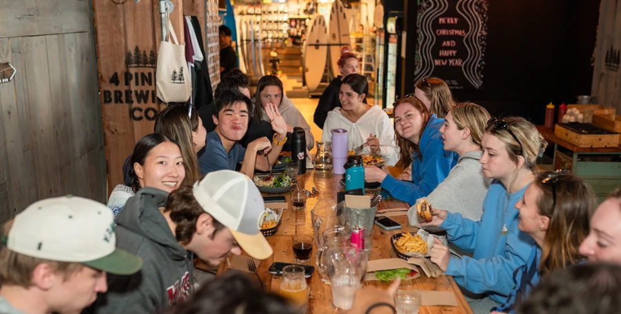 International Summer School students sharing a meal together at the Welcome Dinner.