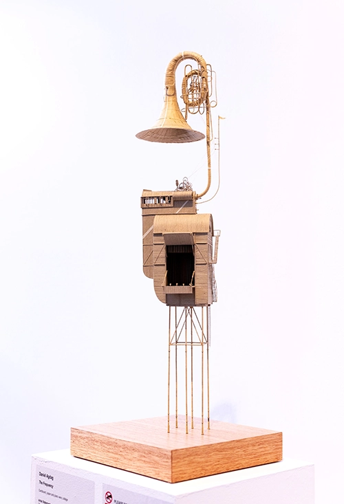 2026-commended-daniel-agdag.webp Daniel Agdad, The Frequency, cardboard, paper and piano wire, 52 x 18 x 12cm, Winner of the Highly Commended Award, supported by UniSuper, in the 2026 Deakin University Contemporary Small Sculpture Award. Image © and courtesy of the artist. Photo by Fiona Hamilton.