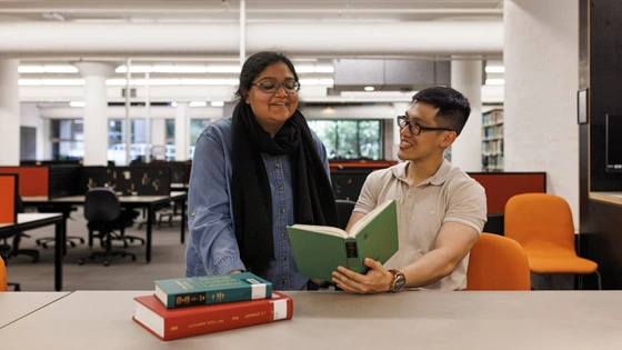 Students read a book