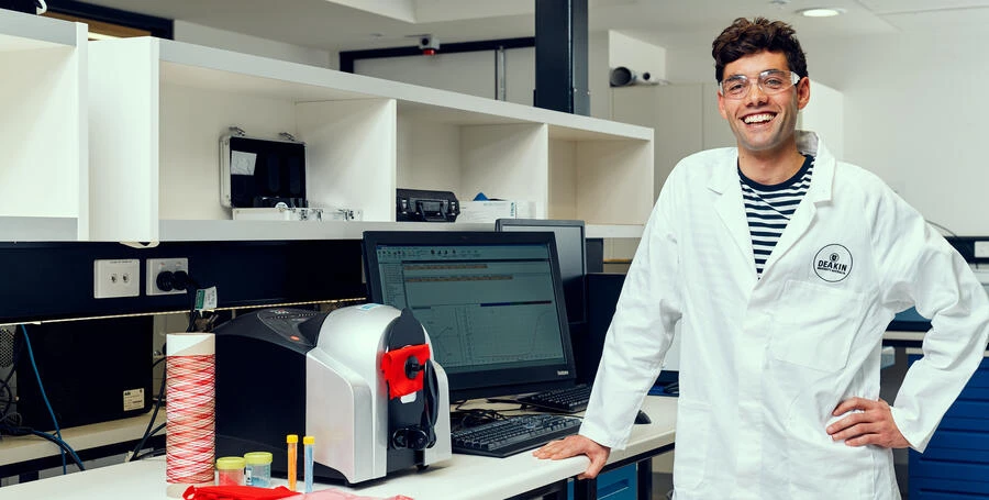 Researcher Lucas Rosson in a lab.