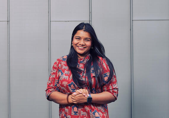A Deakin international student smiles at the camera