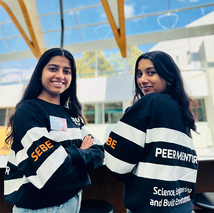 SEBE peer mentors smiles at camera