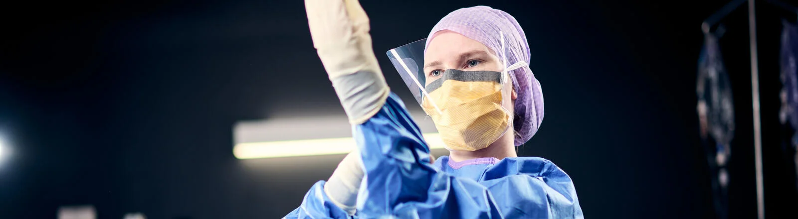 A Deakin postgraduate intraoperative nursing student in full PPE.