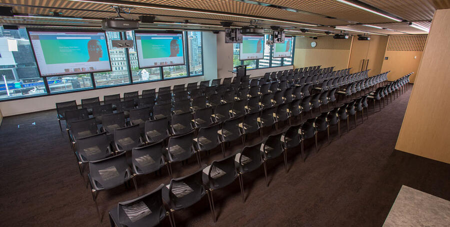 Large theatre room set up with chairs in Melbourne Downtown Corporate Centre.