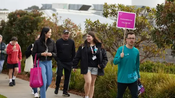 A Deakin staff leading an accommodation tour at the Warrnambool Open Day.