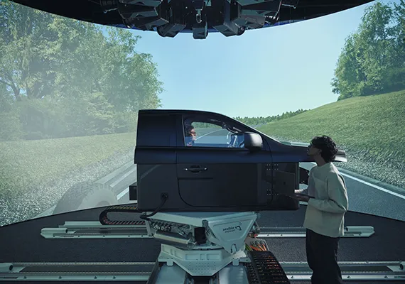 A Deakin researcher in a VR lab