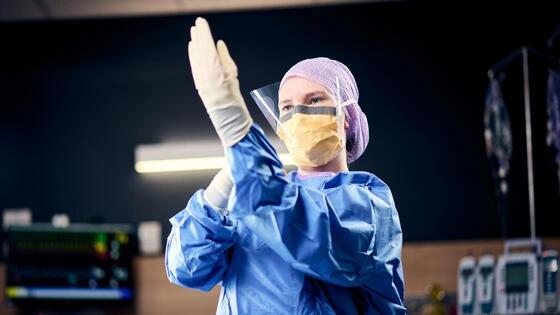 A Deakin postgraduate intraoperative nursing student in full PPE.