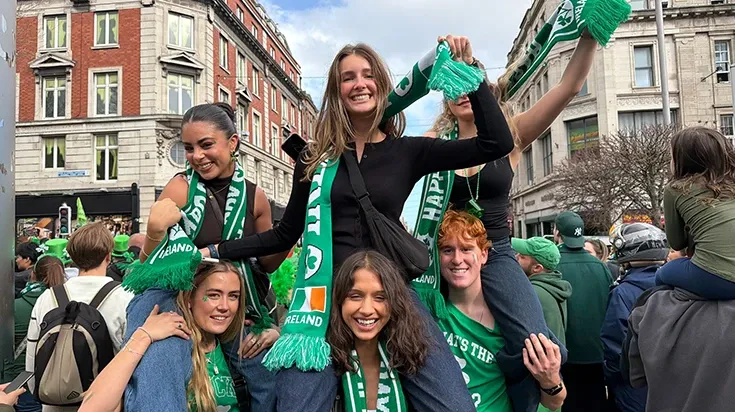 Sarah and friends celebrating with Ireland sports scarves