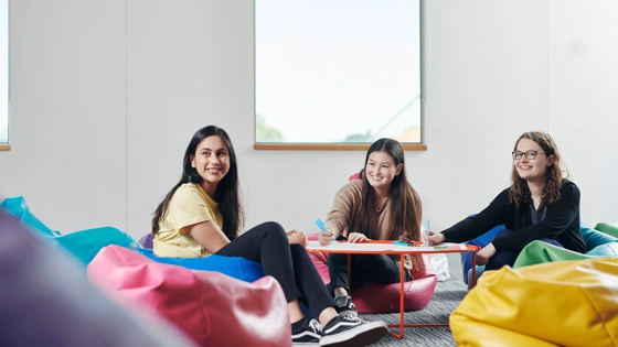 Public Health and Health Promotion students smile while working together