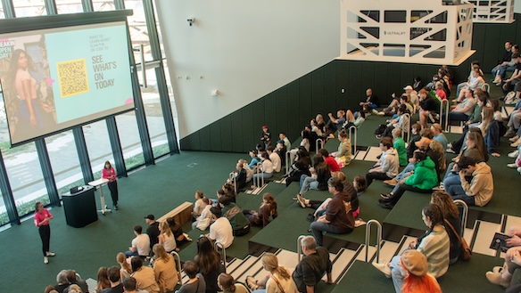 A group of students sitting in an information session in a lecture theatre on Deakin campus.