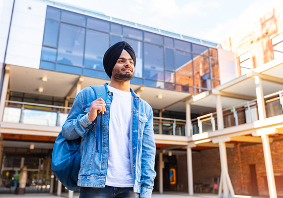 Deakin international student Sabjeet smiles off camera