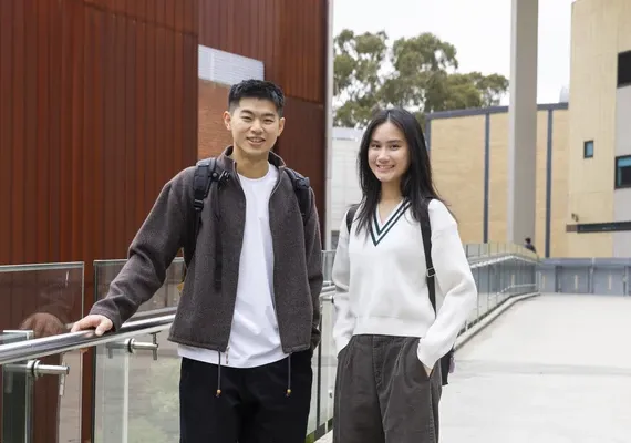 Two students standing on Burwood Campus