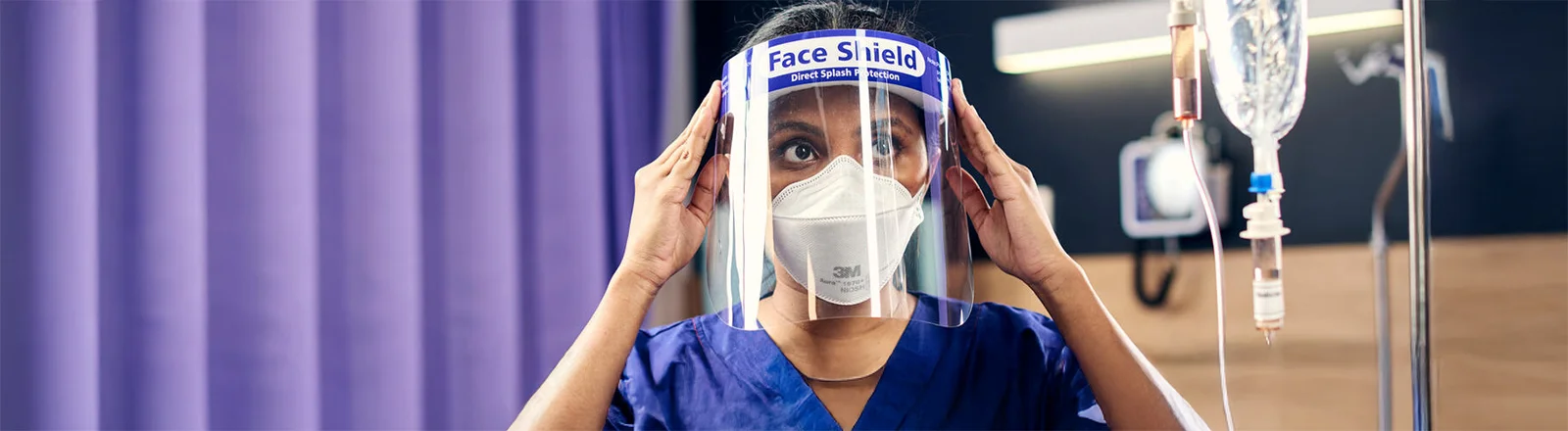 A Deakin Graduate Certificate of Advanced Nursing student wears PPE.