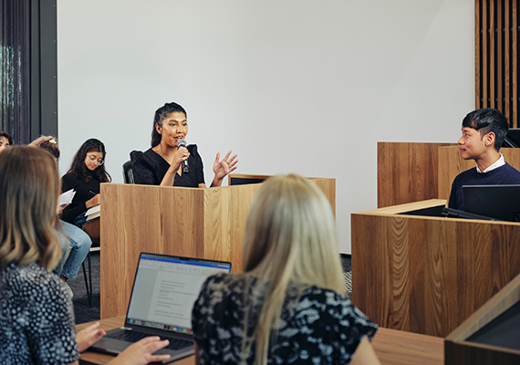 A students in the witness box in a mock trial in the Deakin Moot Court