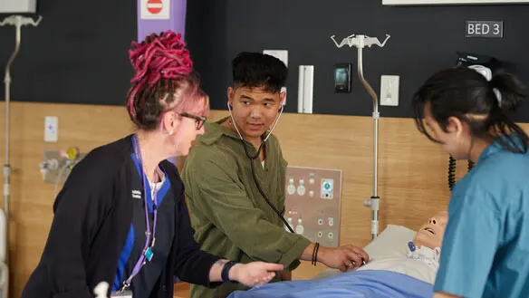 Student participating in a hands on demonstration