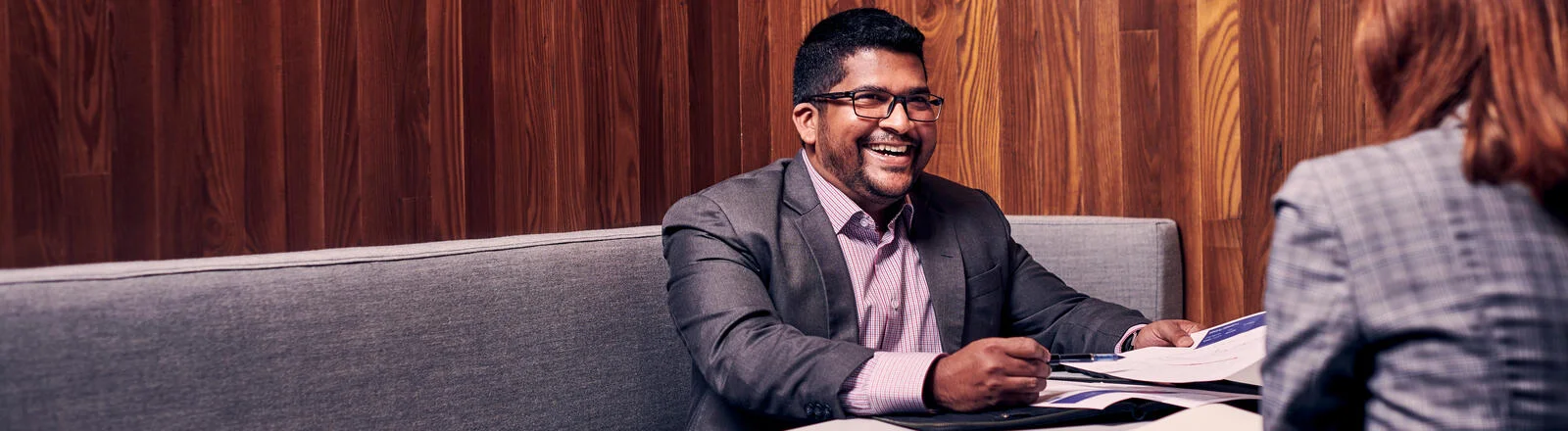 Two Deakin postgraduate financial planning students talk.