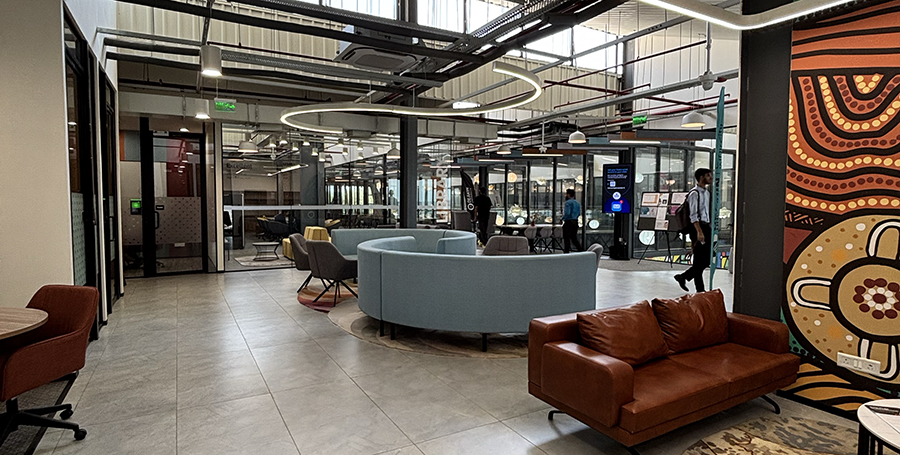 An interior image of Deakin GIFT City campus with comfortable furniture