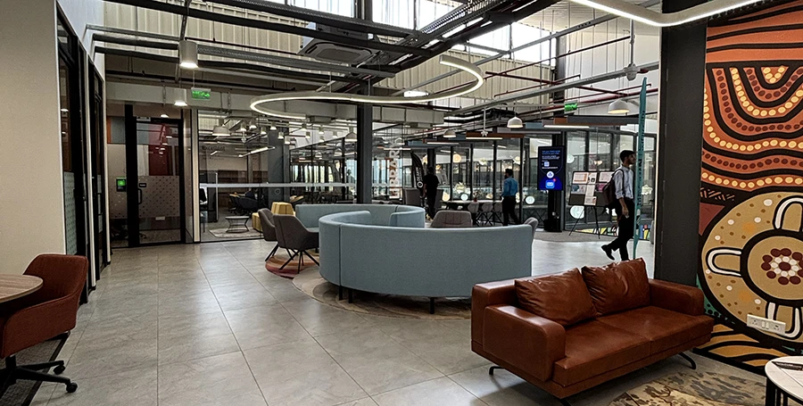 An interior image of Deakin GIFT City campus with comfortable furniture