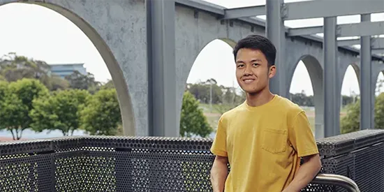 44837_550x275_chern.webp Chern standing outside