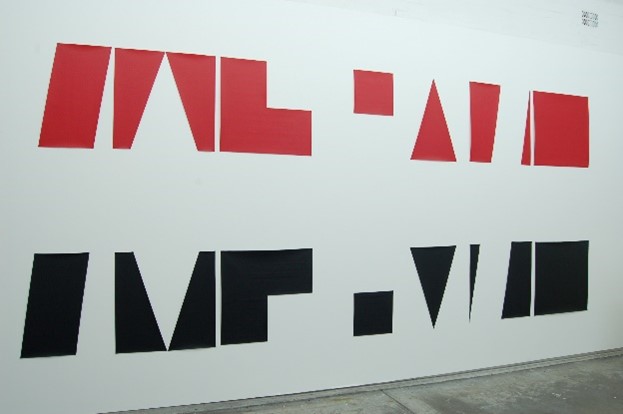 2023_Text_ReRead_Ishak_Loughrey.jpg a painitng of red and black symbols on white