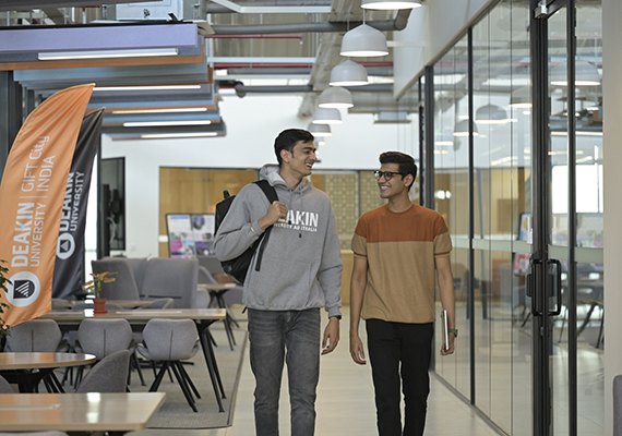 Deakin university GIFT campus students walking inside.