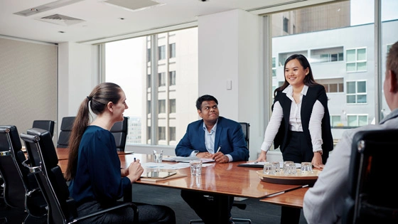 Master of Business Administration students in a boardroom